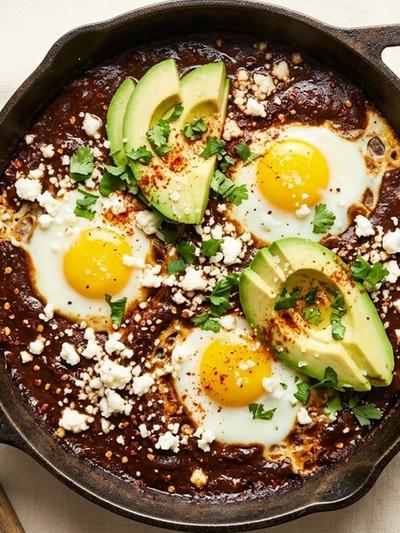 One-Skillet Eggs in Smoky Mole with Cotija & Avocado