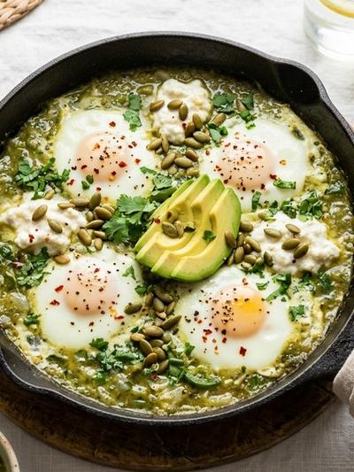 One-Skillet Salsa Verde Ricotta Eggs with Avocado & Pepitas